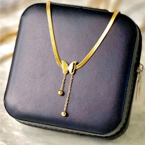 Butterfly necklace, 18 K gold plated stainless steel